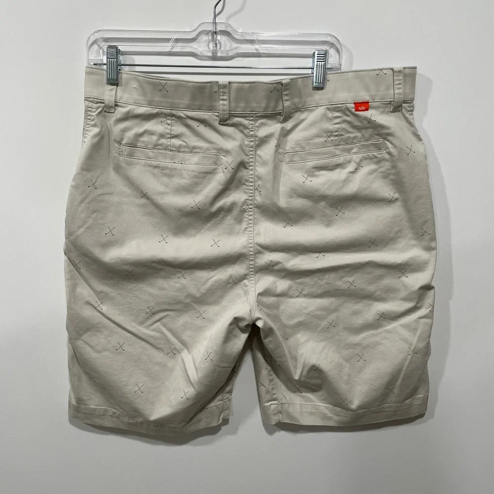 Nike Dri-Fit Golf Shorts Men's Size 36 Beige Golf Club Print‎ Flat Front